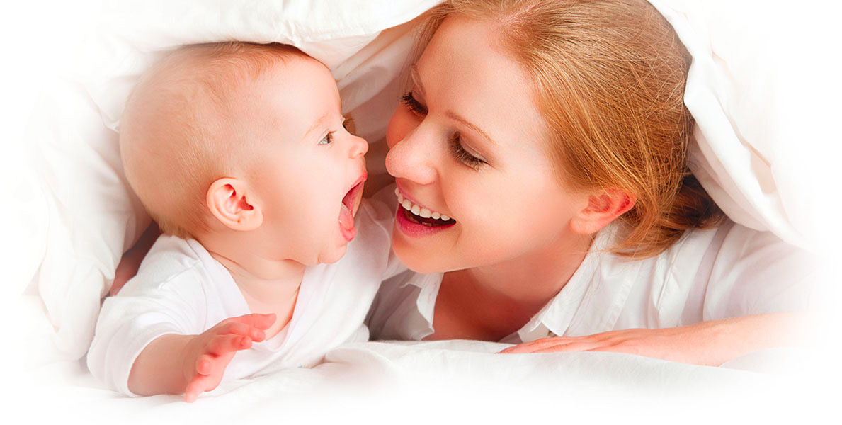 Mother and child smiling at each other